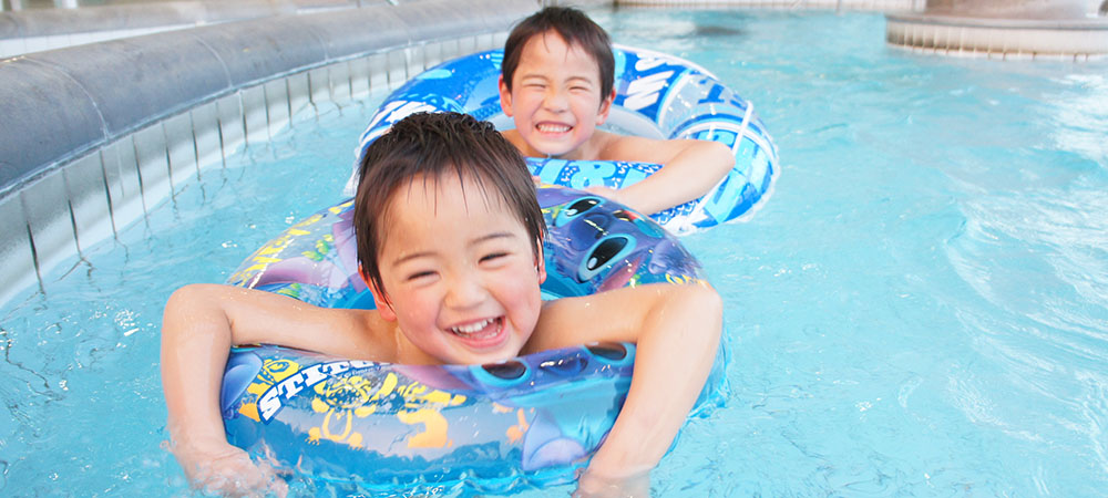 Children floating in pool at Hilton Odawara Resort &amp; Spa Kids Club