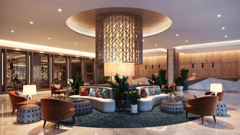 DoubleTree by Hilton Vientiane Lobby with several seating areas, chairs and tables, and a large lighting fixture