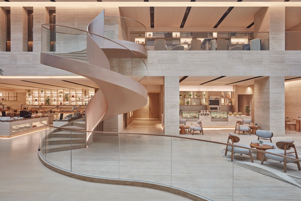 Hilton Gurugram Baani City Centre - CEO Lounge Staircase, spiral pink staircase leading up to open floor