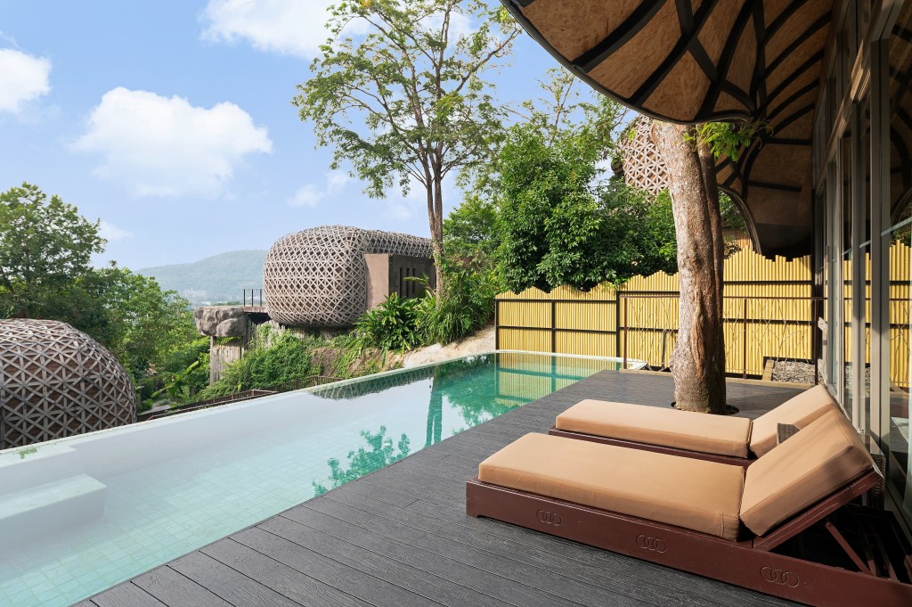 Keemala, an SLH Hotel, Birds Nest Pool Villa, infinity pool, pool chaise chairs, deck built around tree