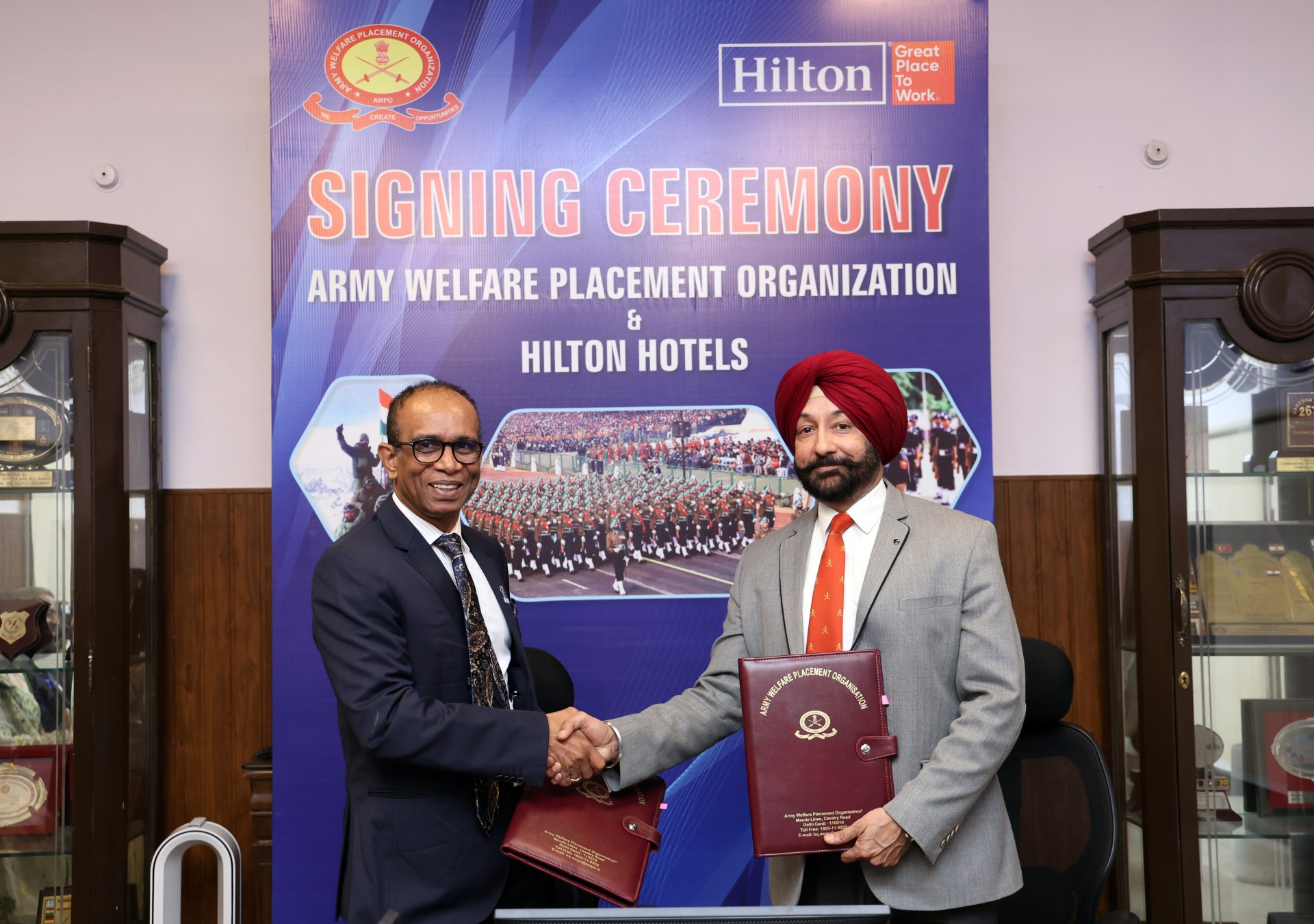 L-R - Sabu Raghavan, vp, human resources, South Asia, Hilton and Col. Kanwaljit Singh Uppal, AWPO at Hilton X AWPO MOU Signing
