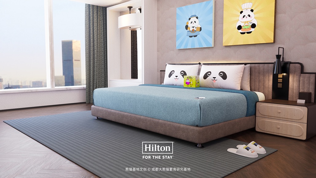 Hilton Hua Hua Panda Themed Room featuring customized amenities — from slippers and bedding designed with Hua Hua’s lovable image