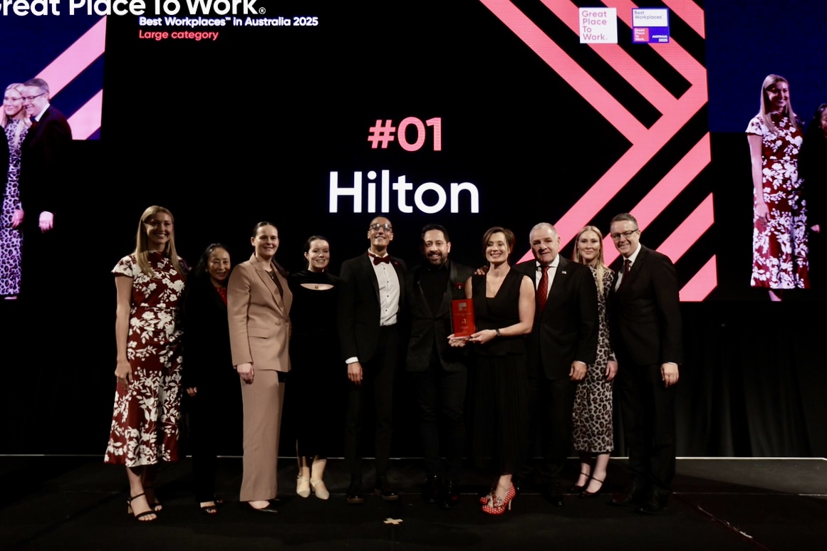 Group of Hilton Team Members on stage at ceremony for Hilton being named No. 1 Best Workplace in Australia 2025