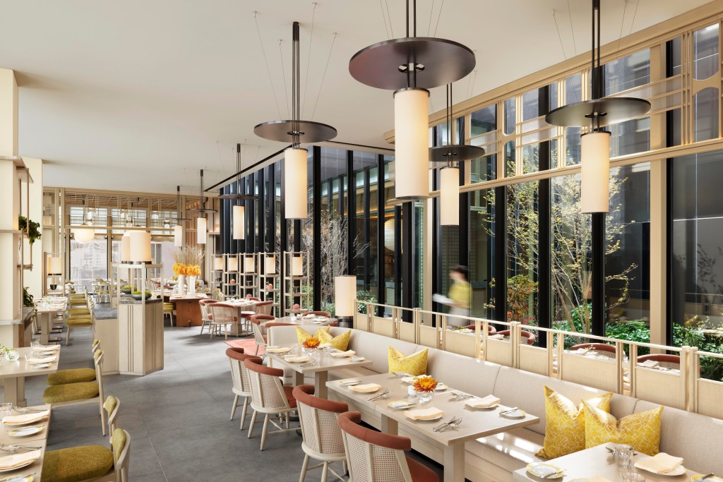 Waldorf Astoria Osaka Jolie Brasserie Restaurant with booths and set tables