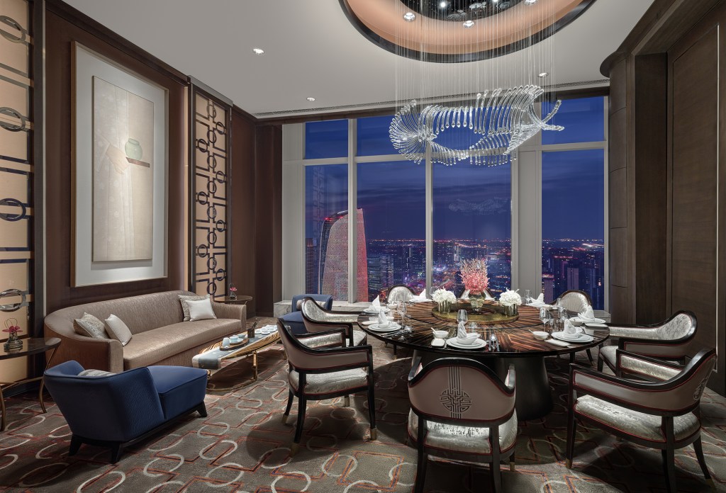 Waldorf Astoria Chengdu - Infinite Luck Private Dining Room - 运·中餐厅包间, private dining room with skyline view of city, private dining room with lounge seating area and formal dining seating area, large framed artwork