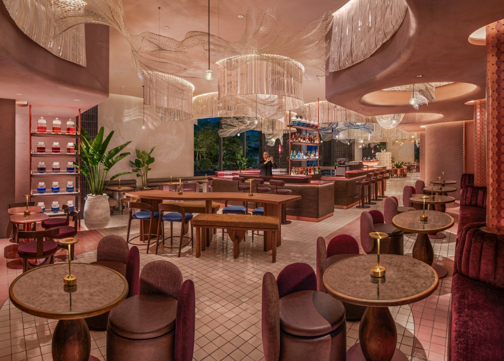 A bar with many small tables