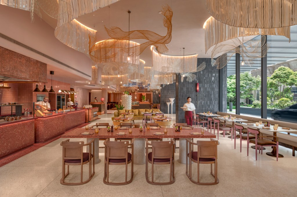 A dining room with various seating options and a buffet
