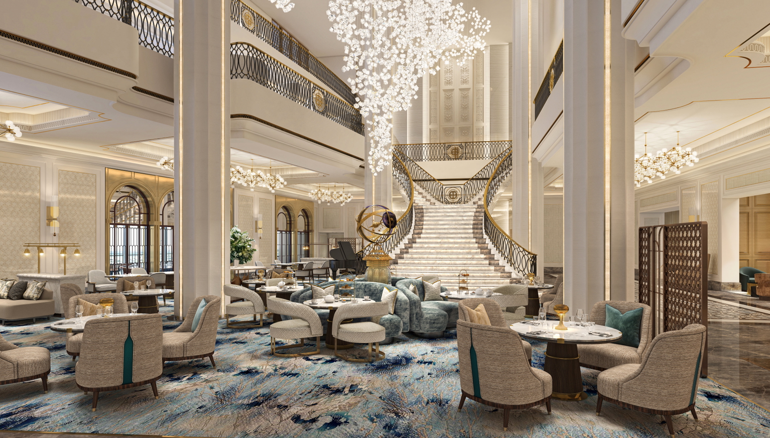 a seating area with many tables and chairs in front of a dramatic staircase.