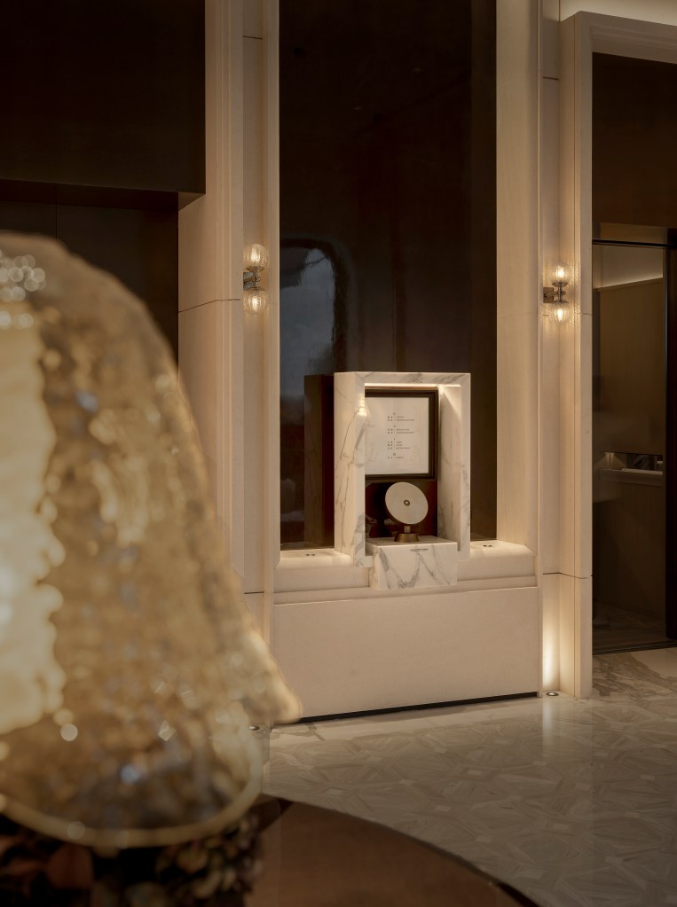 Details of the lounge with marble accents, and elegant finishes