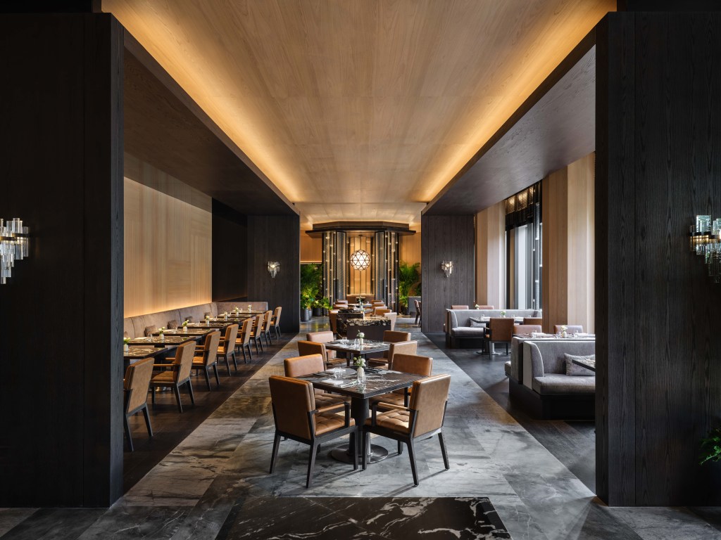 An elegant dining room with various seating options.