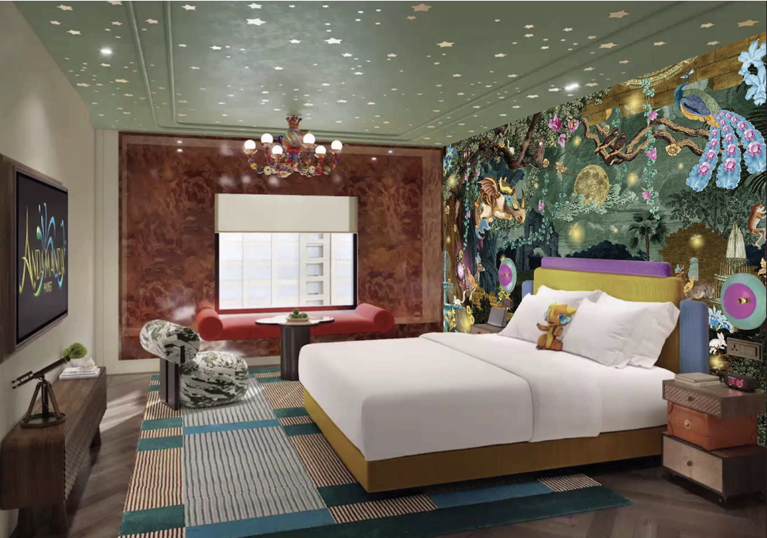 Guest room at Andamanda Voyage, Curio Collection by Hilton with a bed, colorful headboard, star-patterned ceiling, and a mural featuring animals and nature on one wall.