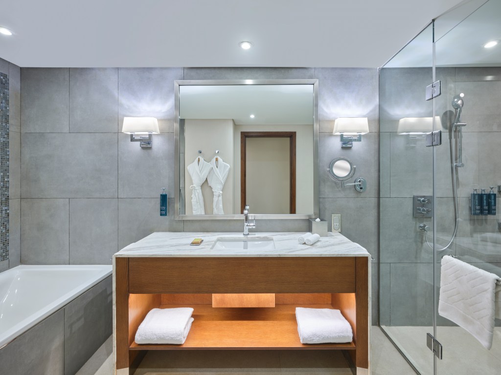 Hilton Cairo Nile Maadi - Guest Room Bathroom, separate bath and shower on either side of mirror and sink area