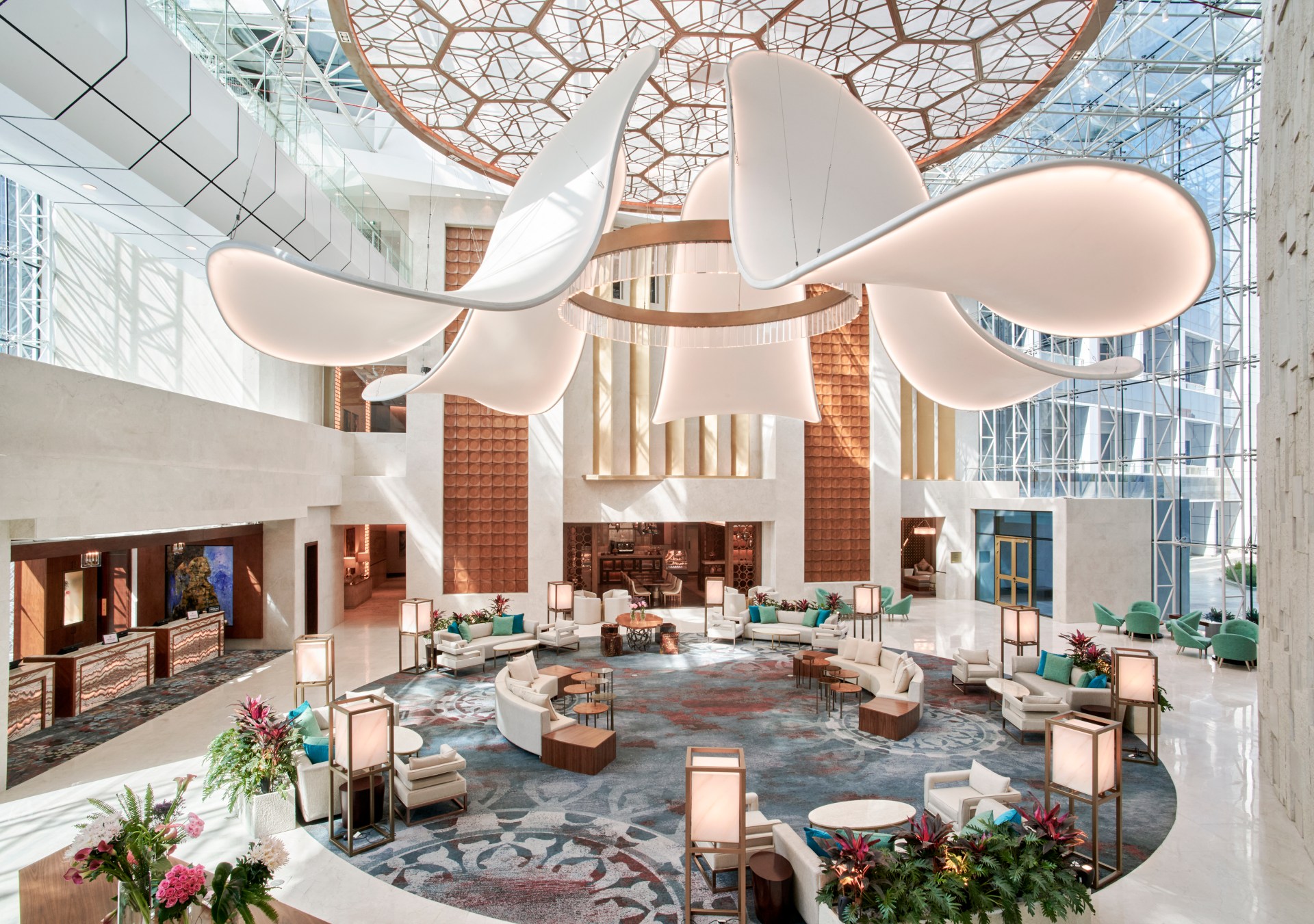 Hilton Cairo Nile Maadi - Lobby, seatubg area in a circular set up, large flower-like chandelier,