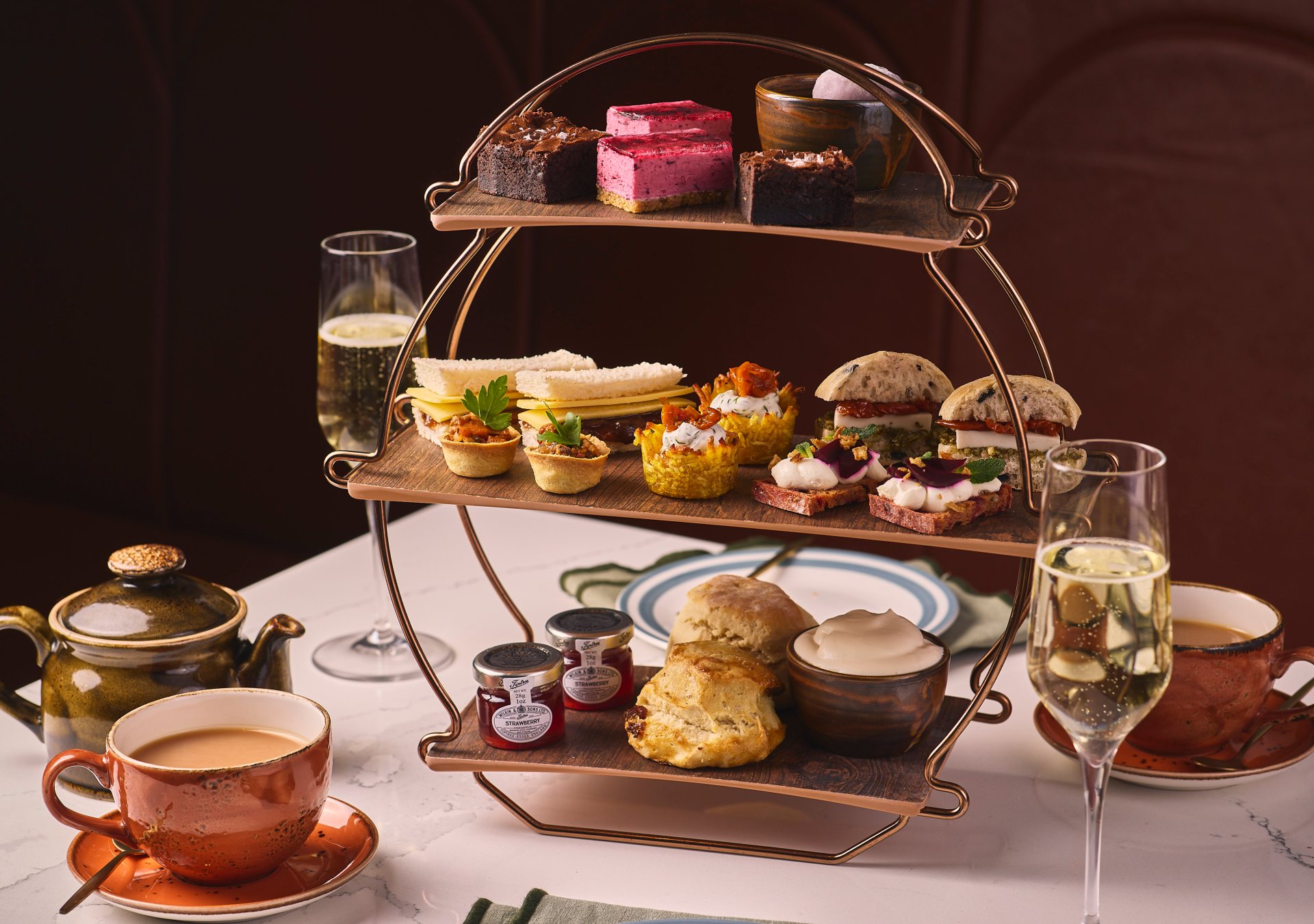 Hilton and Only A Pavement Away ‘OpportuniTEA’ Afternoon Tea Menu, 3-tier stand, champagne glasses, tea cups and saucers, tea pot