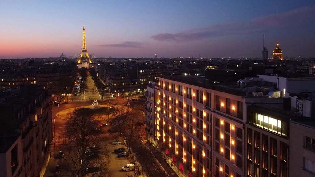 Sax Paris LXR Hotels Resorts Facade Night Time, view of Eiffel tower