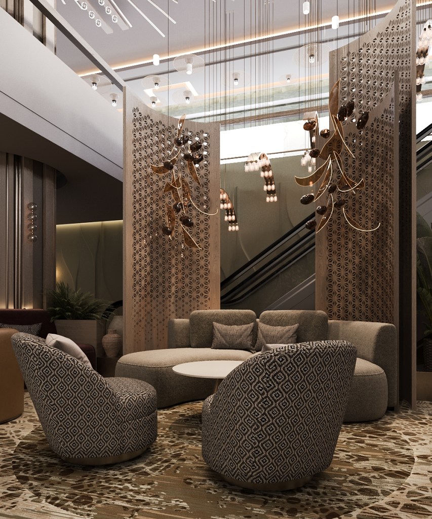 Diyar Ajwa, Tapestry Collection by Hilton - Lobby seating area couch and chairs with decorative chandeliers