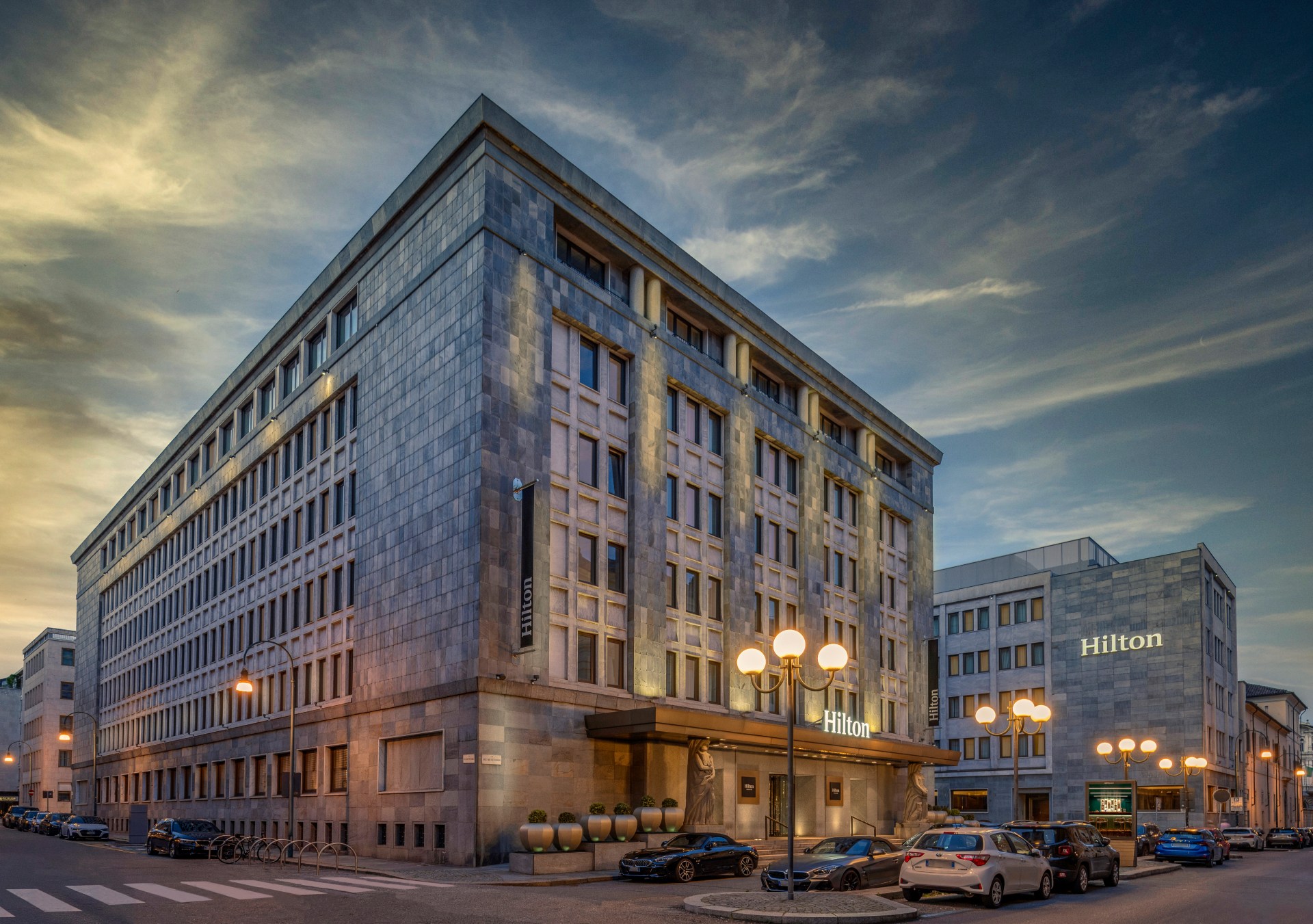 Hilton Turin Centre exterior at dusk