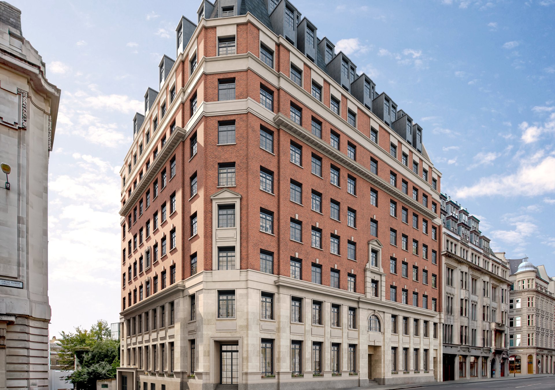 The Derby London City, Curio Collection by Hilton exterior - brick corner building with blue sky