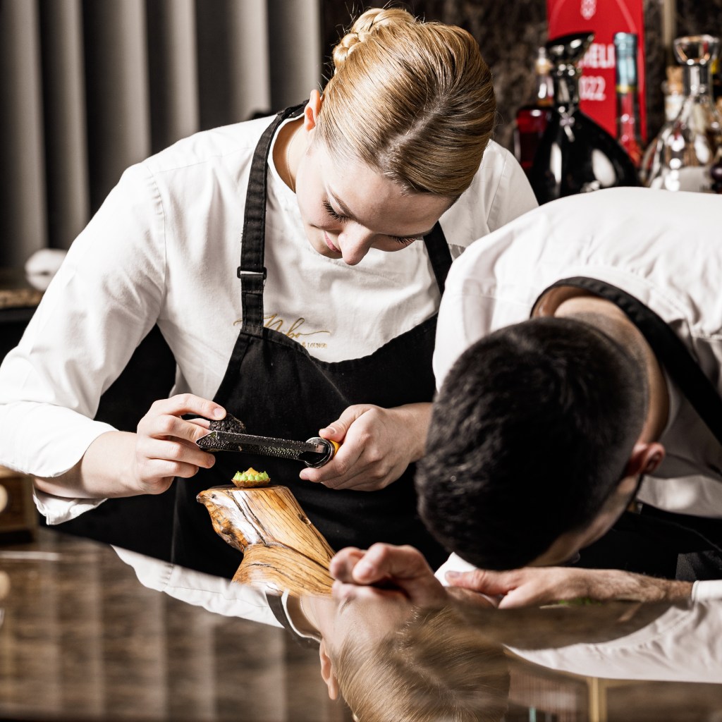Chefs Gabriela Filca and Saša Janović in the kitchen at Nebo Restaurant & Lounge