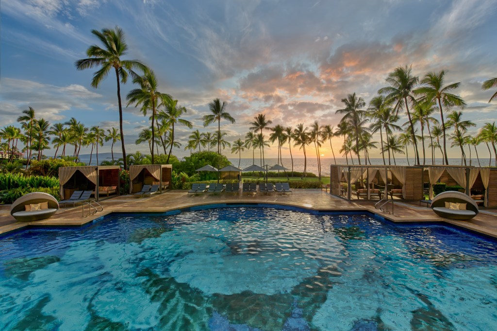 Grand Wailea, A Waldorf Astoria Resort Hibiscus Serenity Pool, pool, palm trees, cabanas, ocean view, pool daybeds, chaise lounge pool chairs with umbrellas