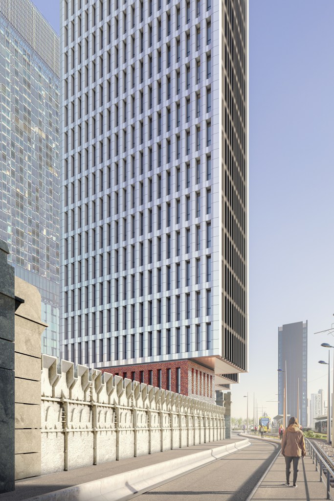 The outside of the Hampton by Hilton Manchester City Centre Metrolink Station Road as viewed from the sidewalk