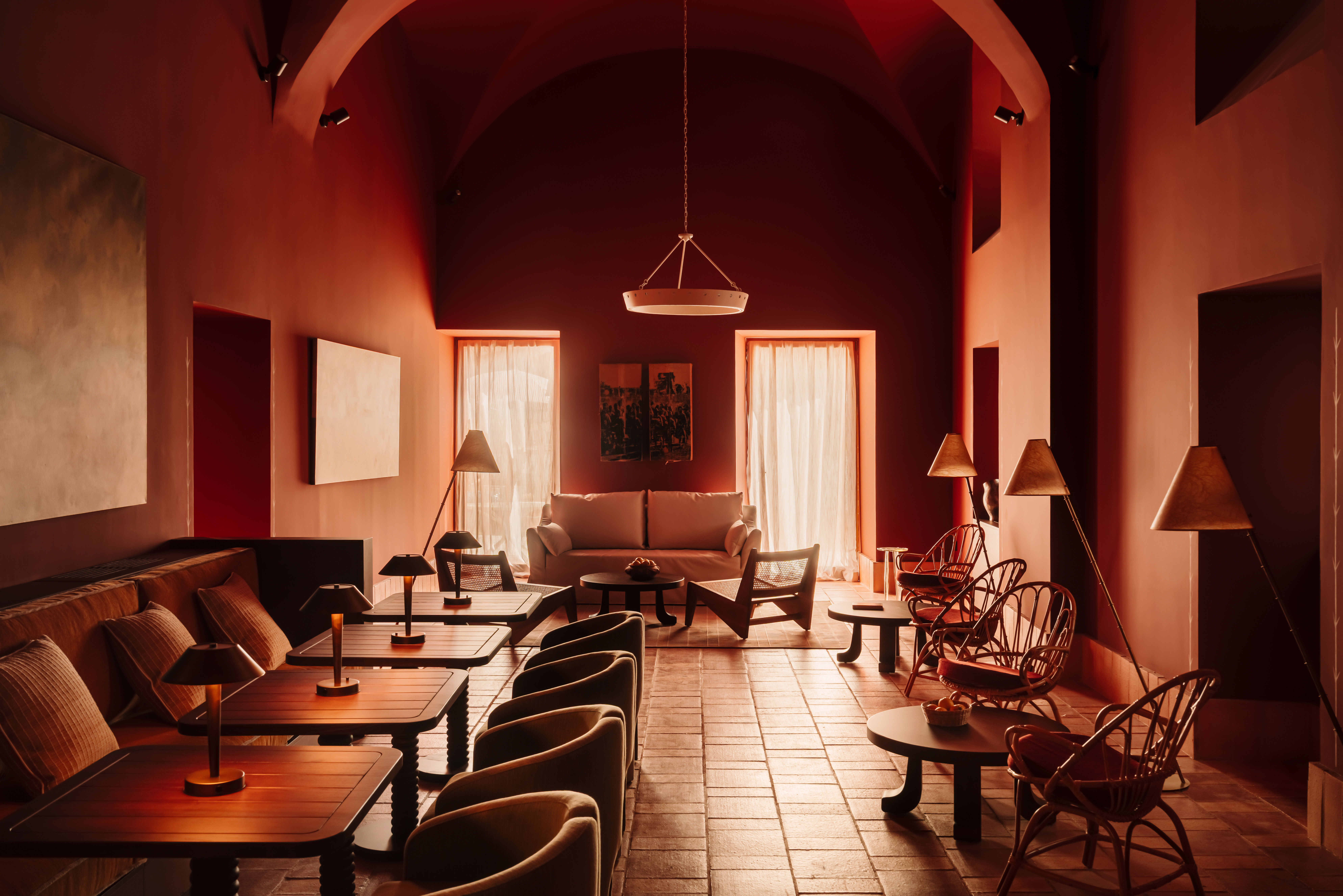 Cozy bar at the Palacio de Godoy Caceres with various seating options.