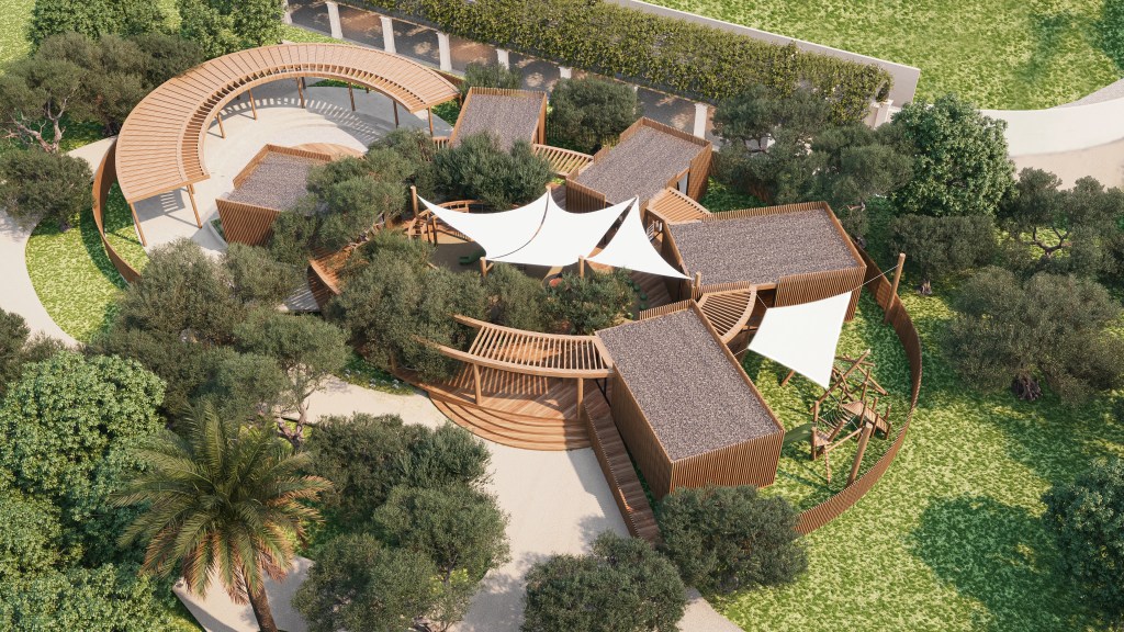 Conrad Corfu - Kids Area - kids area from above - wood buildings, trees, white canopies