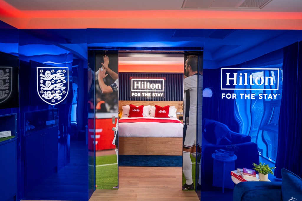 The door to the bedroom featuring a football player
