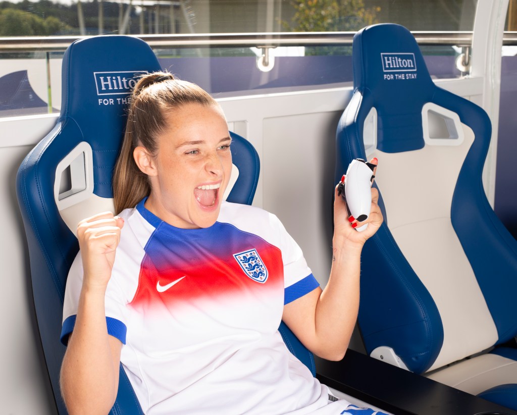 Ella Toone cheering holding a game controller
