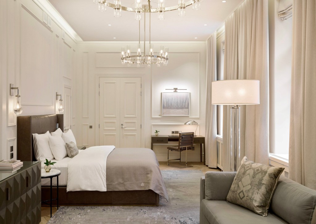 Elegant guest room with neutral tones and modern decor.