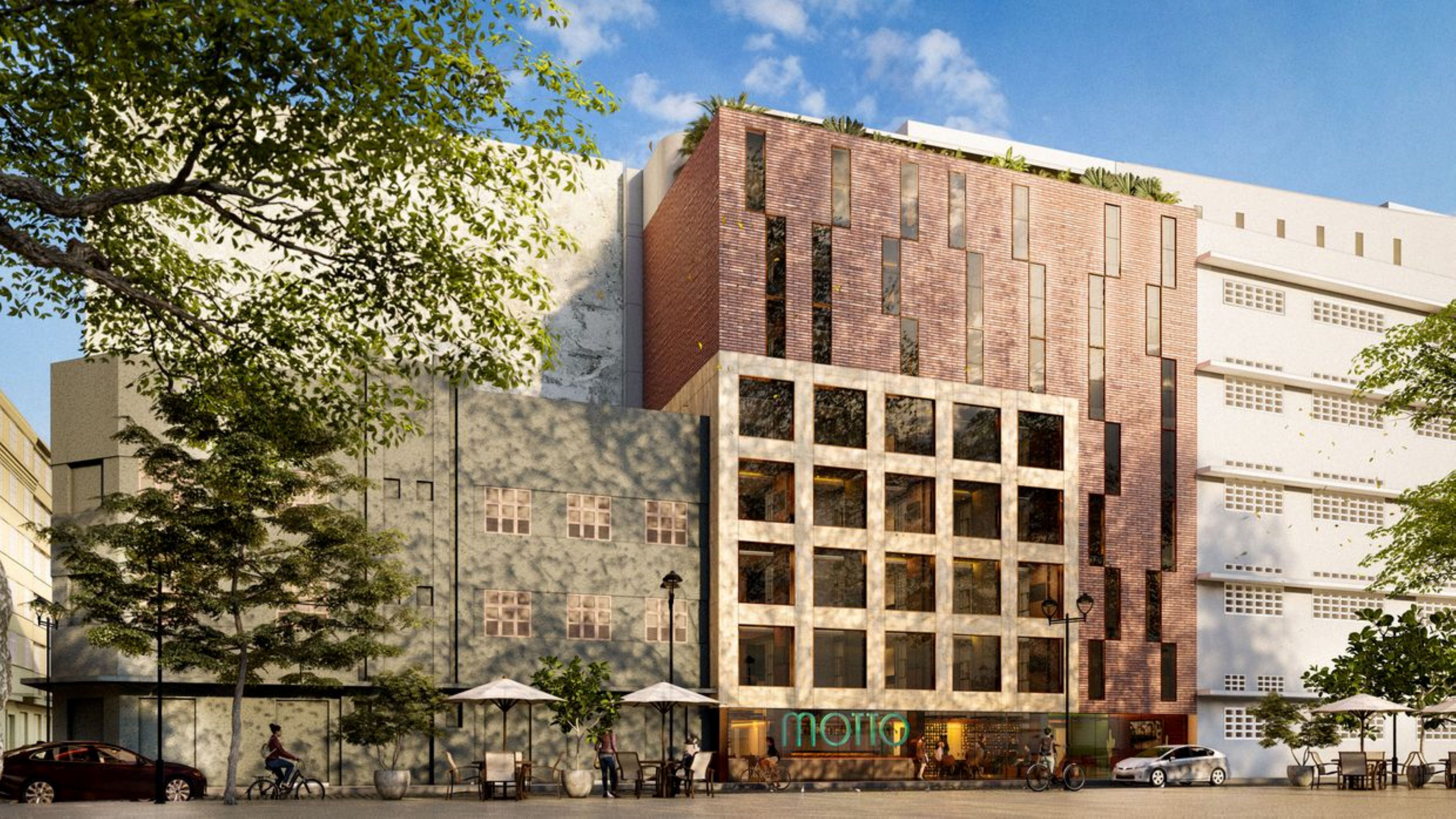 the exterior of the hotel with street running in front