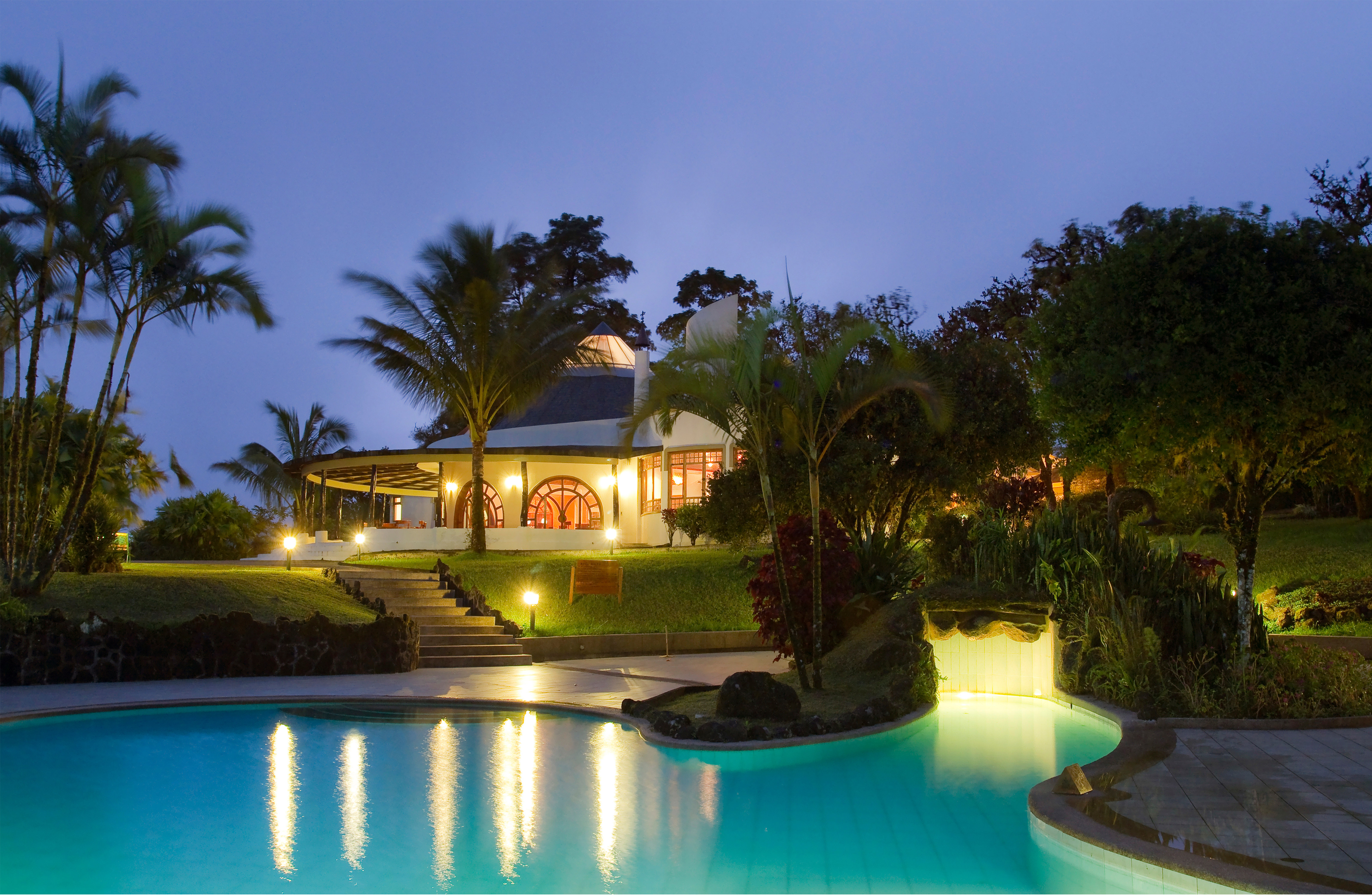 Royal Palm Galapagos, Curio Collection by Hilton Exterior at Night with Pool