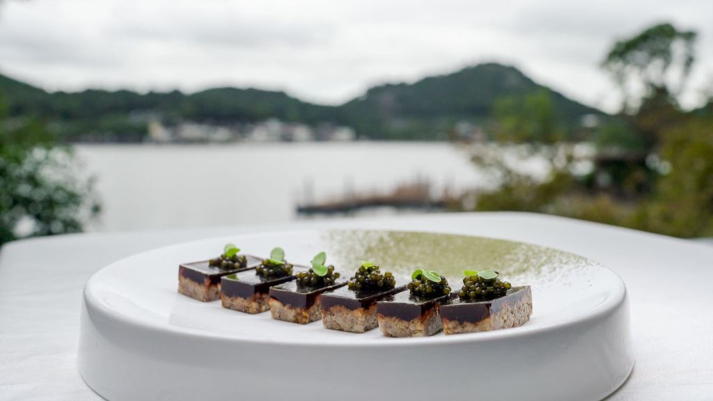 Hilton Ningbo Dongqian Lake Signature Dish Crystalline Salted Fish and Pork Gelatin With Black Caviar