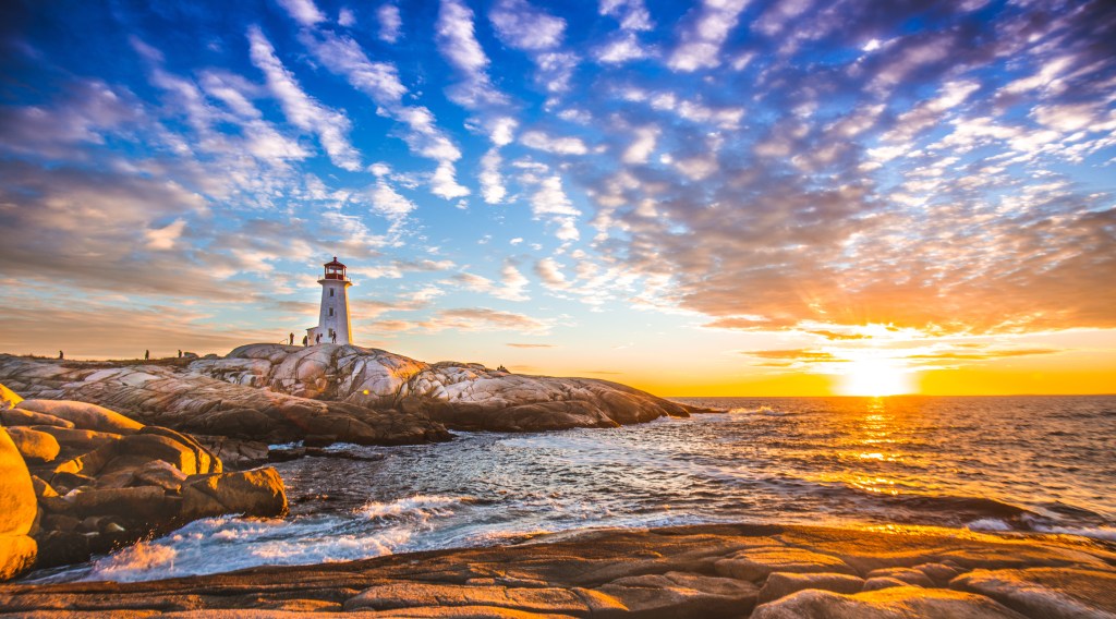 Peggy's Cove Lighthouse Sunset Ocean View Landscape In Halifax Nova