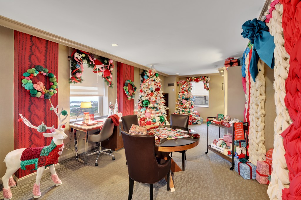 Hallmark Christmas hotel room with xmas decorations at hilton Chicago office board games