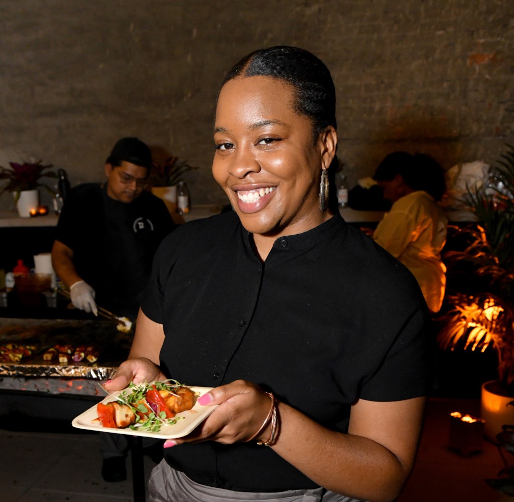Shenarri Freeman showcases her culinary creation at an exclusive Hilton Honors event with Questlove at Motto by Hilton New York City Chelsea