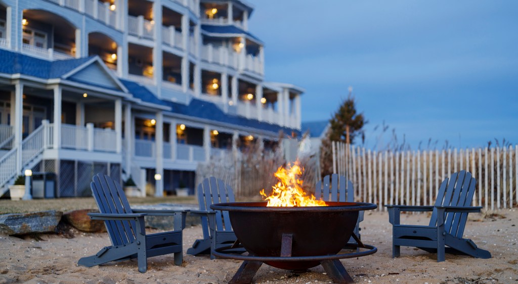 fire pits and seating at Madison Beach Hotel, Curio Collection by Hilton