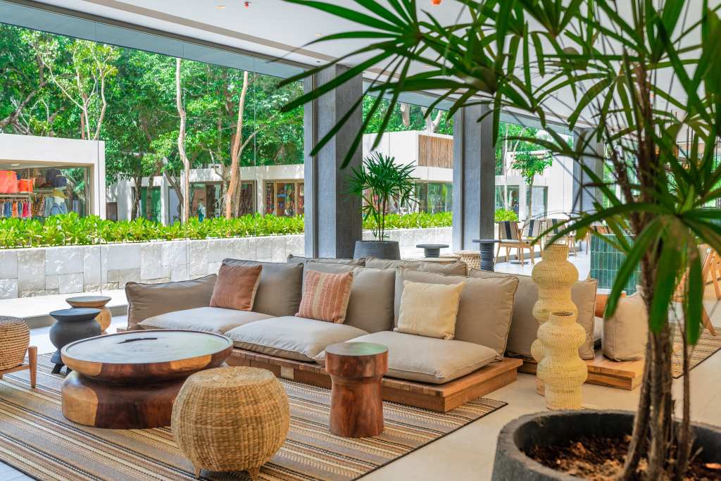 seating and tables in The Commons, Motto by Hilton Tulum