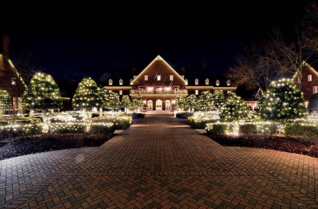 Night shot featuring lights at the Founders Inn and Spa, Tapestry Collection by Hilton