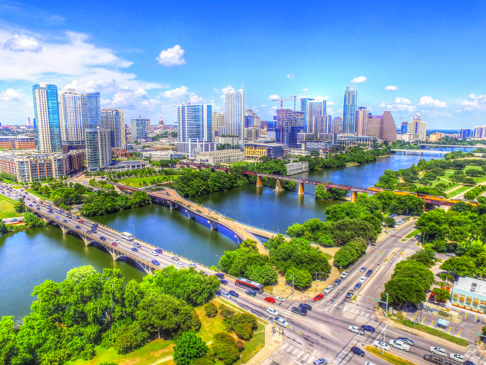 pet hotel travel hilton Austin,Texas,Skyline,Cityscape,Bridges,Over,Ladybird,Lake,Aerial,View