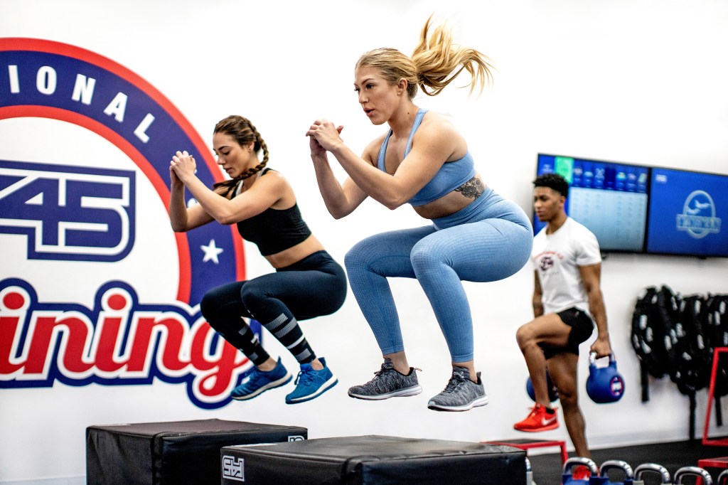 People working out at F45 Training studio at Hilton Austin