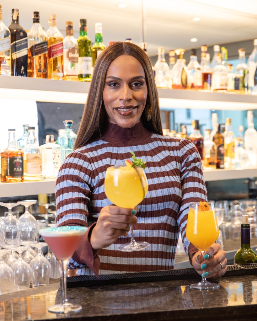 Mixologist Rochelly Rangel with cocktails