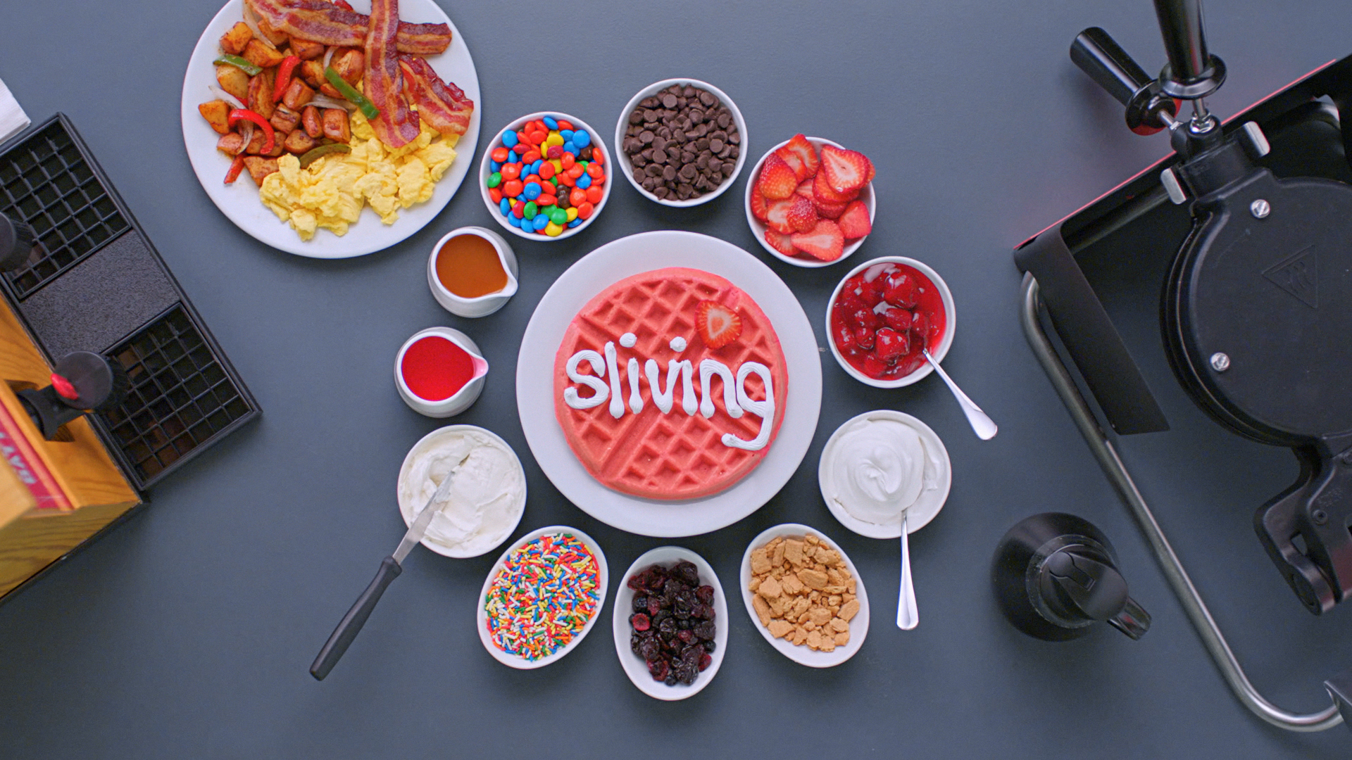 Hampton by Hilton Strawberry Waffle and Toppings with 'Sliving' written in whipped cream