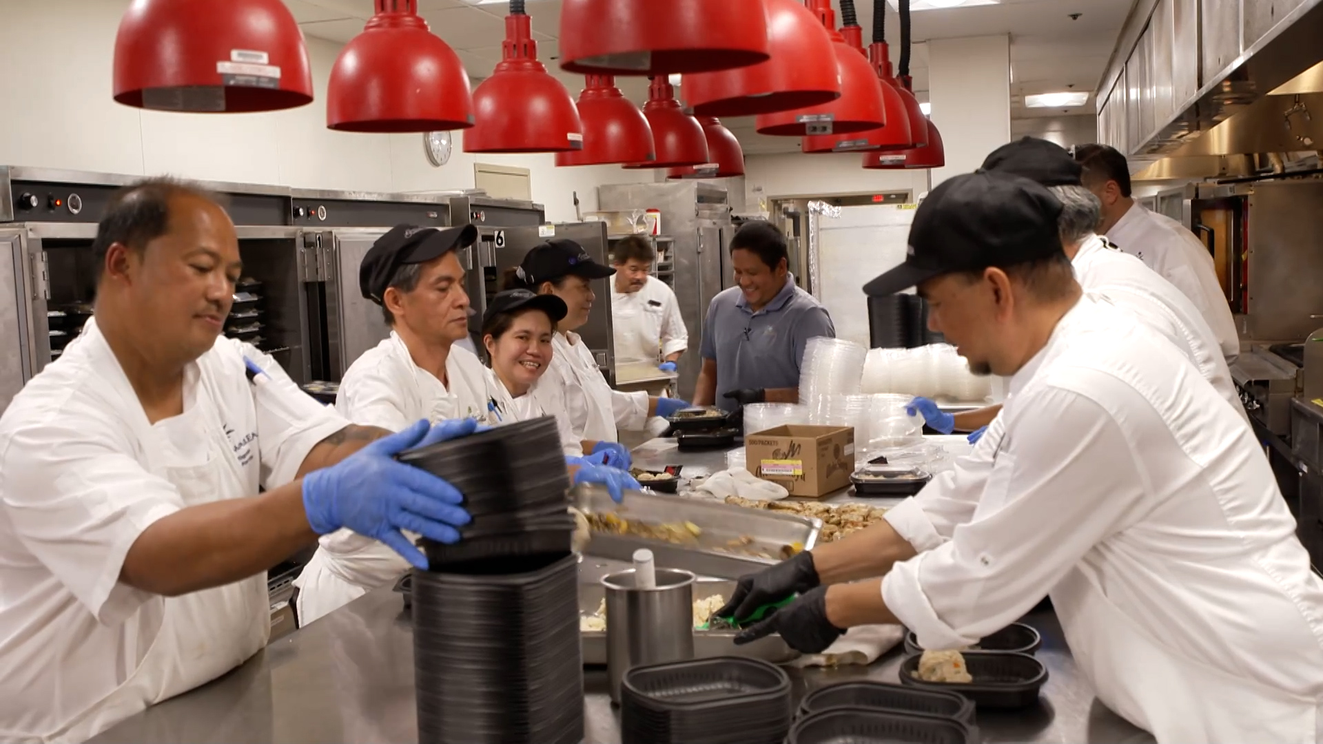 chefs preparing meals at Grand Wailea Maui as part of Maui fire relief