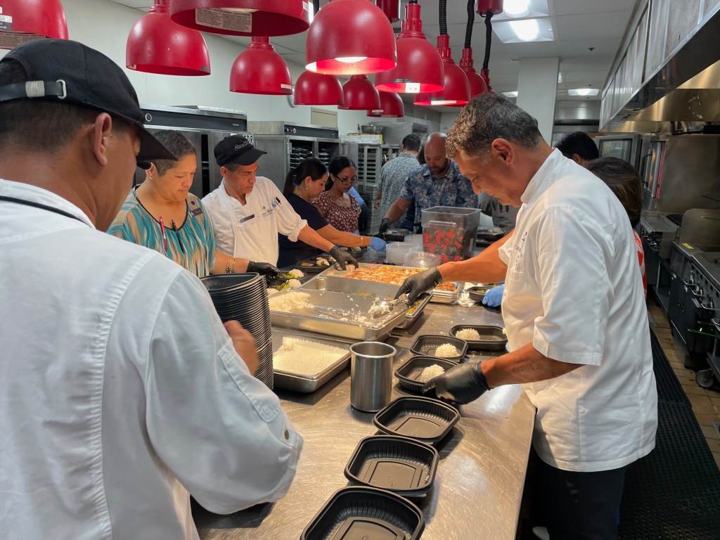 chefs and team members preparing meals at Grand Wailea Maui