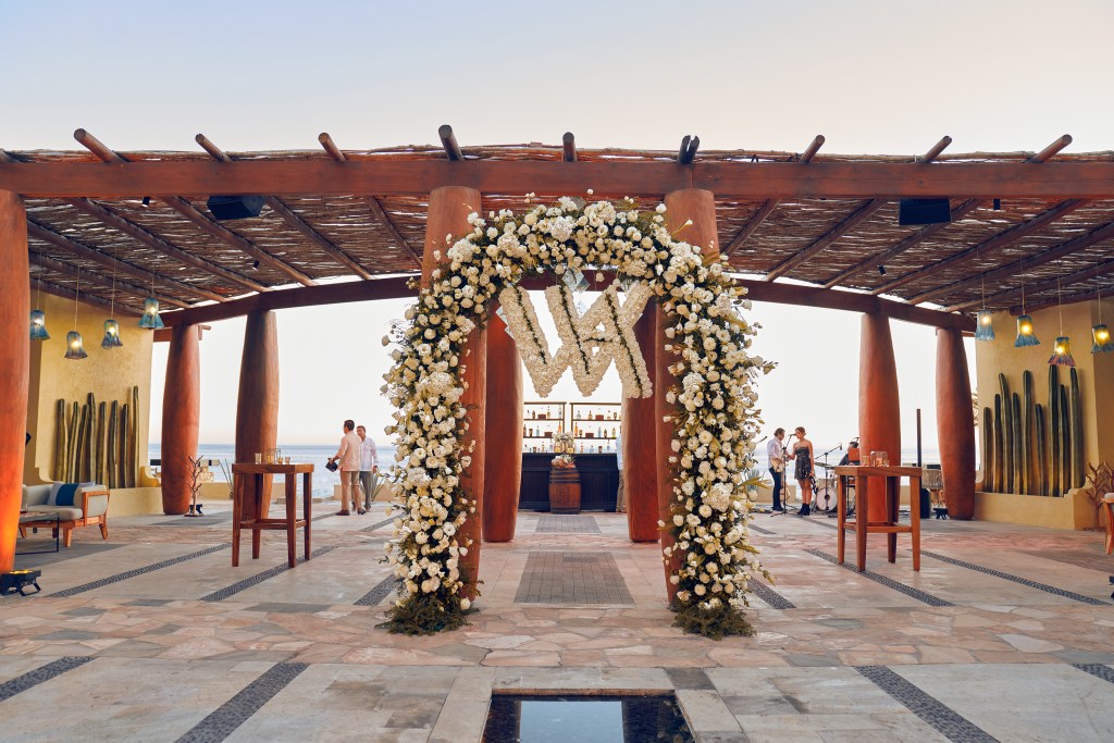 flower arch outdoors at Waldorf Astoria Los Cabos Pedregal