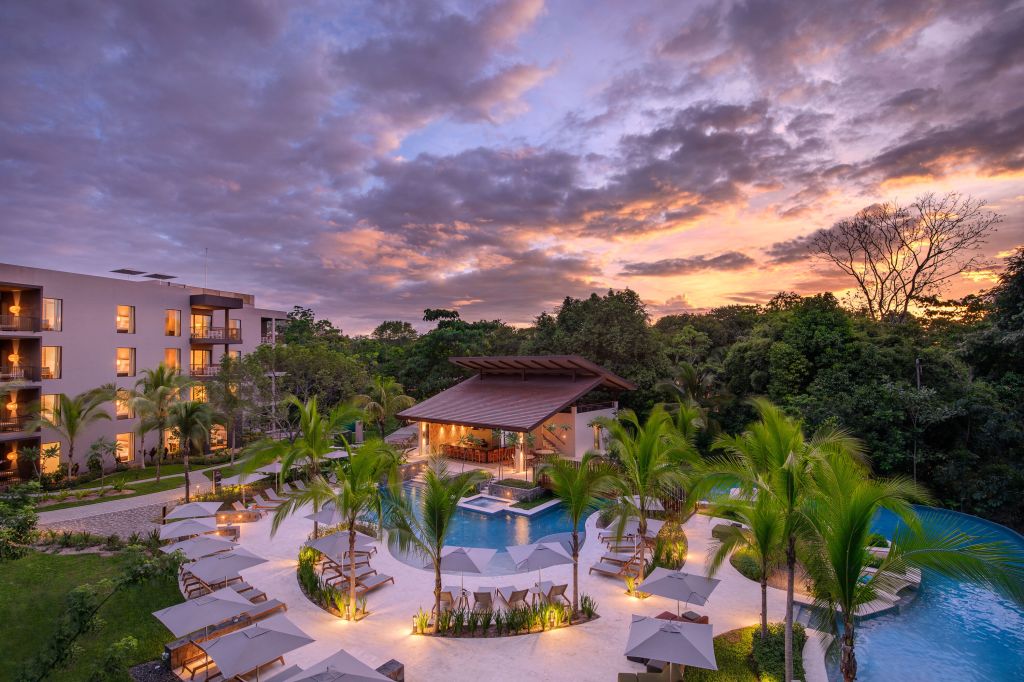 Botanika Osa Peninsula, Curio Collection by Hilton - Pool Sunset