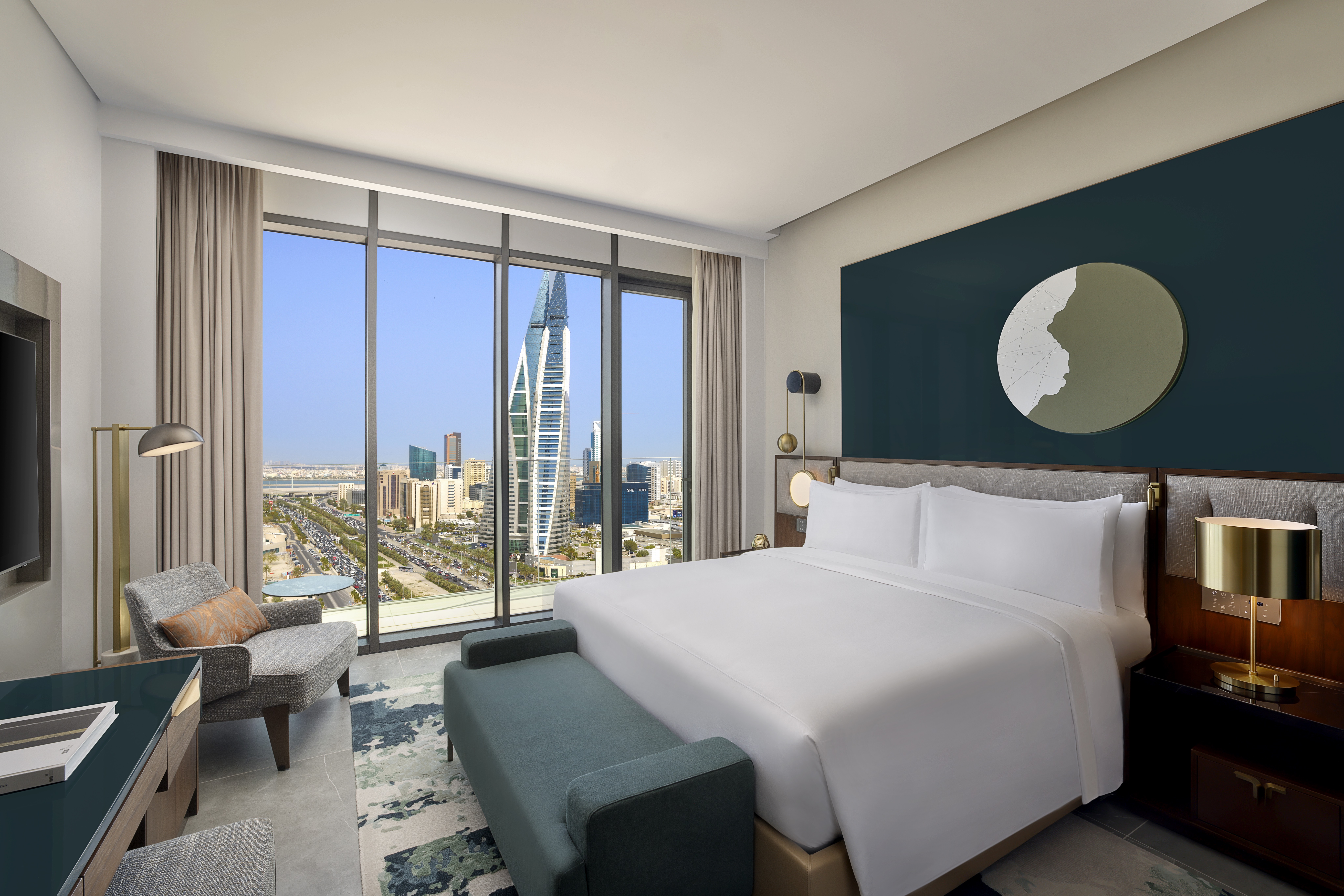 Conrad Bahrain Financial Harbour - King Premier Three Bedroom Residential Suite - bedroom with large windows overlooking the city