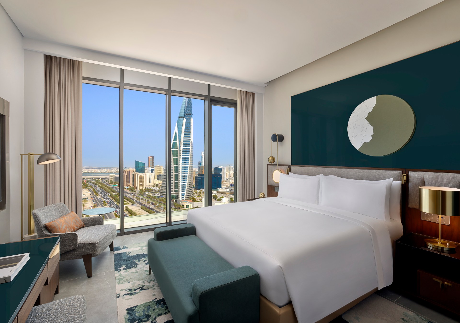 Conrad Bahrain Financial Harbour - King Premier Three Bedroom Residential Suite - bedroom with large windows overlooking the city