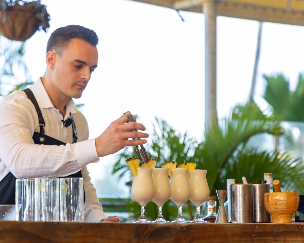 Bartender Preparing Pina Coladas